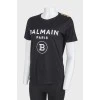 Black T -shirt with a white log of brand