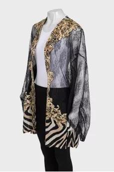 Lace cape with silk inserts