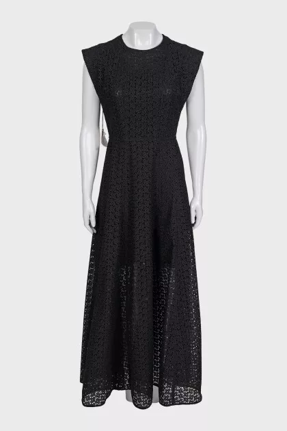 Black maxi dress with perforated detailing and tag