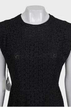 Black maxi dress with perforated detailing and tag