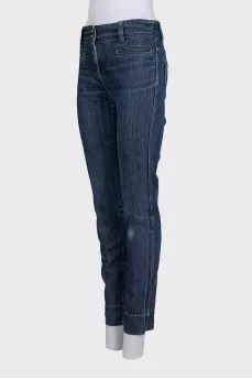 Blue straight-leg jeans with a mid-rise