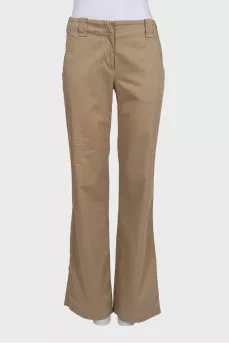Beige mid-rise trousers with pockets