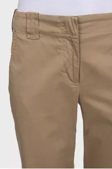 Beige mid-rise trousers with pockets