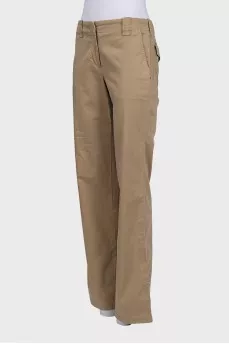 Beige mid-rise trousers with pockets