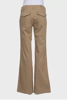 Beige mid-rise trousers with pockets