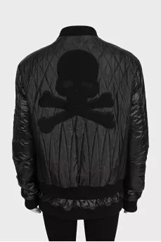 Black quilted bomber jacket with signature logo on the back