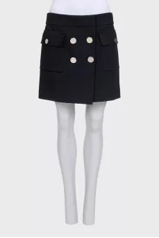 Black mini skirt with silver buttons
