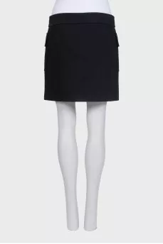 Black mini skirt with silver buttons
