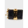 Black leather and gold metal clutch bag