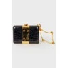 Black leather and gold metal clutch bag