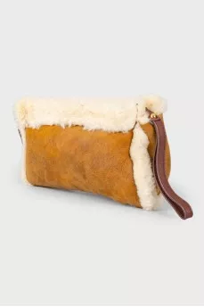 Leather bag with fur inserts, on a zipper