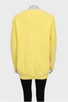 Жовтий светр oversize крою із V-подібним вирізом