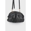 Black leather bag with leather fringe, zippered