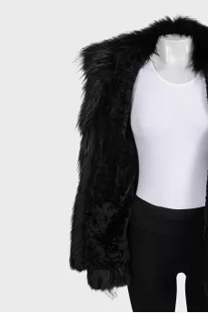 Black sheepskin coat decorated with fur