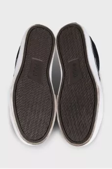Black textile sneakers with a branded patch