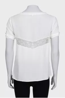 White blouse with short sleeves decorated with lace