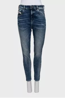 Blue skinny fit jeans with a distressed effect