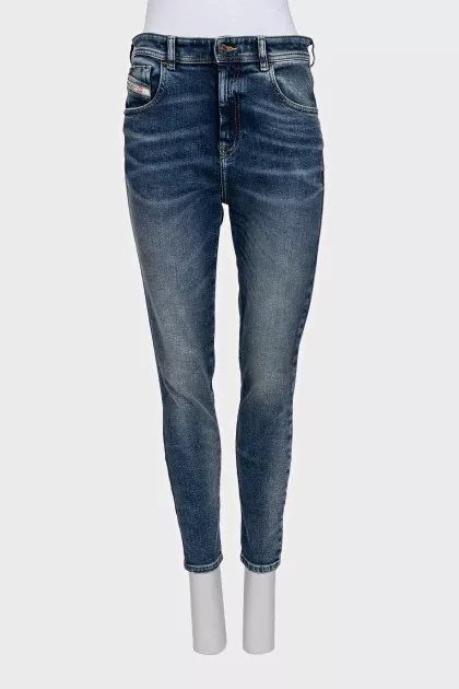 Blue skinny fit jeans with a distressed effect