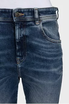 Blue skinny fit jeans with a distressed effect