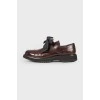 Brown leather brogs on rubber sole