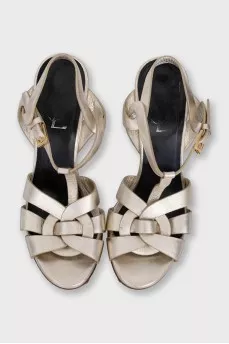 Tribute sandals in gold leather