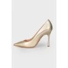 Golden stiletto heels