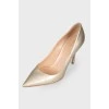 Golden stiletto heels