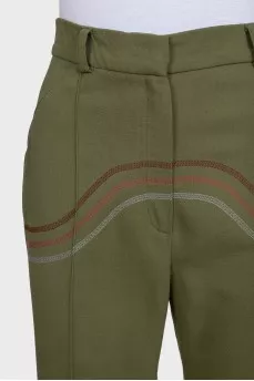 Green wide-leg trousers with decorative seams