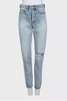 Light blue straight-leg jeans with a ripped effect