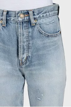 Light blue straight-leg jeans with a ripped effect