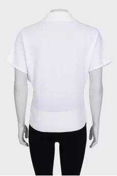 White button-down t-shirt with wide sleeves