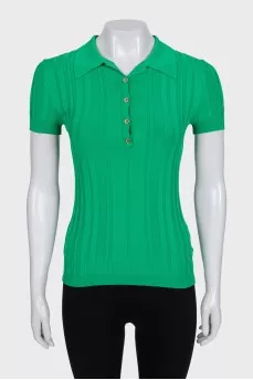 Green polo shirt with gold buttons