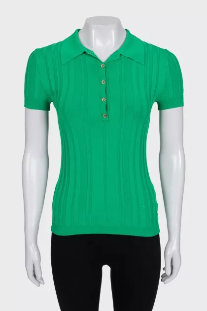 Green polo shirt with gold buttons