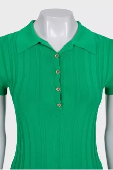 Green polo shirt with gold buttons