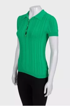 Green polo shirt with gold buttons