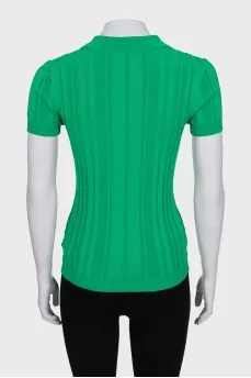 Green polo shirt with gold buttons
