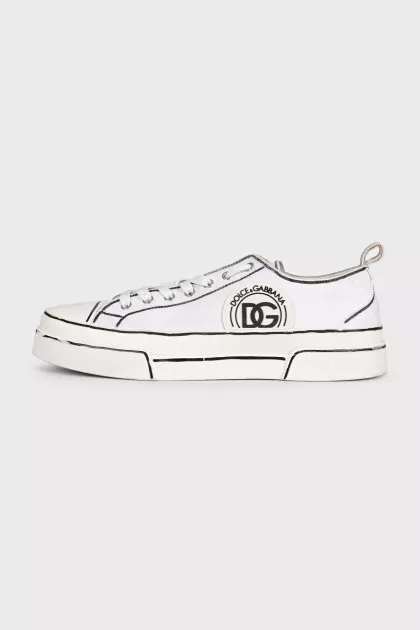Чоловічі кеди білого кольору з чорною окантовкою