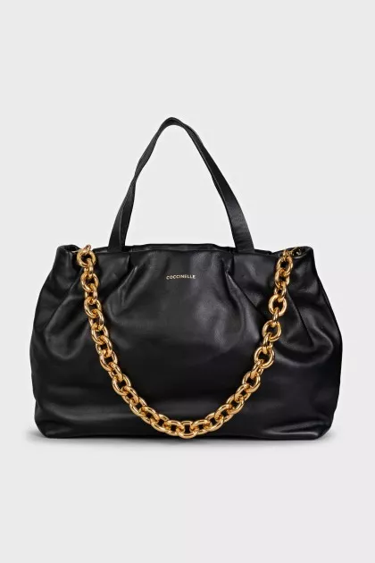 Black leather bag with gold chain