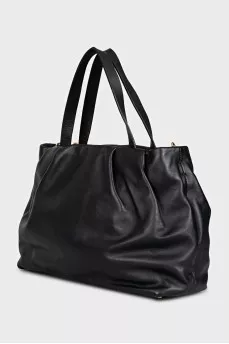 Black leather bag with gold chain