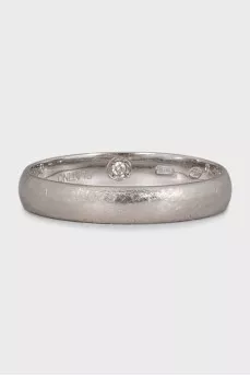 The ring is decorated with a diamond