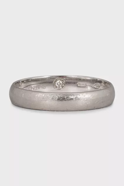 The ring is decorated with a diamond