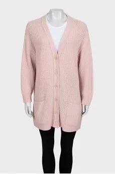 Pink knitted cardigan with a straight cut and a V-neck