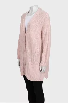 Pink knitted cardigan with a straight cut and a V-neck