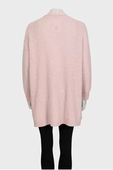 Pink knitted cardigan with a straight cut and a V-neck