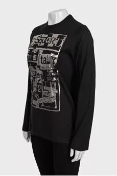 Black long sleeve t-shirt with silver print and tag