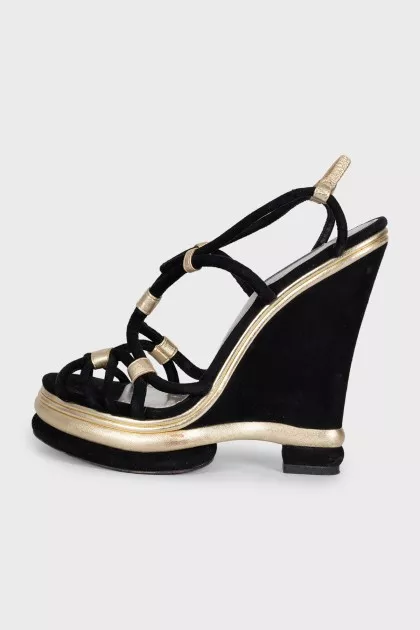 Black suede sandals with gold trim