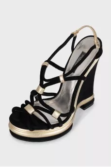 Black suede sandals with gold trim