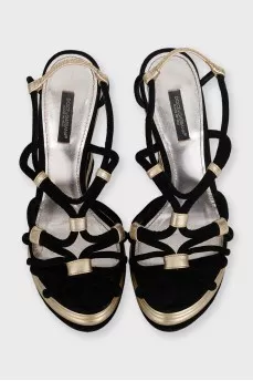 Black suede sandals with gold trim