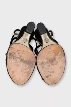 Black suede sandals with gold trim