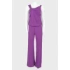 Purple jumpsuit with brooch
